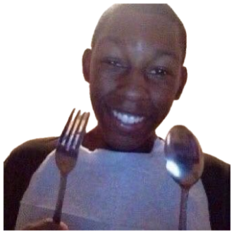 Kid in a napkin bib holding up a fork and spoon, grinning like dinner is served sticker