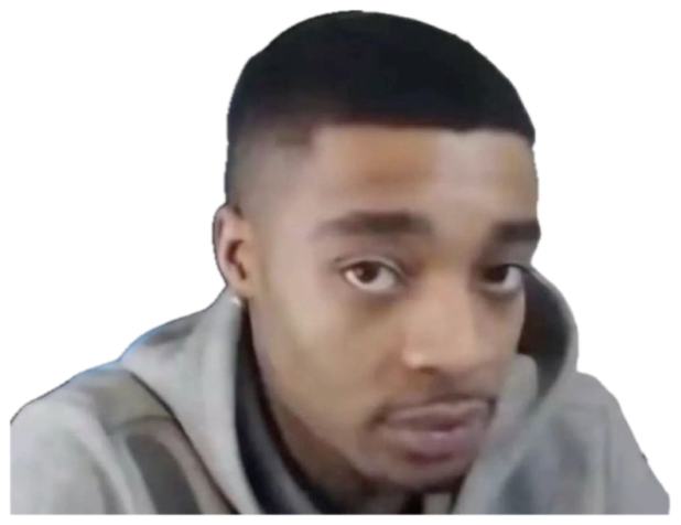 A man in a gaming chair giving a flat, unimpressed stare at the camera sticker
