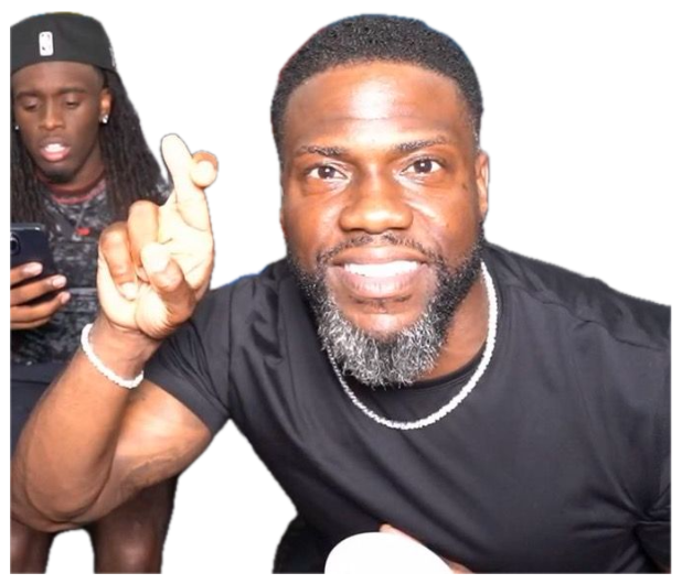 Kevin Hart on a livestream holding up a finger mid-point, grinning like he's got a point sticker