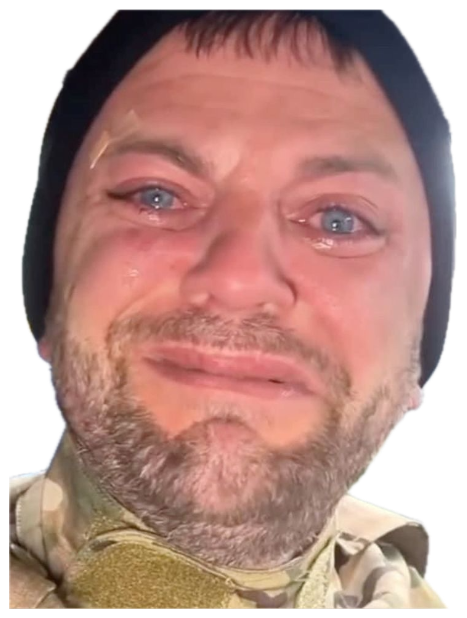 Man in military gear crying in his car with red-rimmed watery eyes sticker