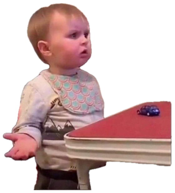Toddler sitting at a tiny desk looking deeply unimpressed and mildly puzzled about something sticker