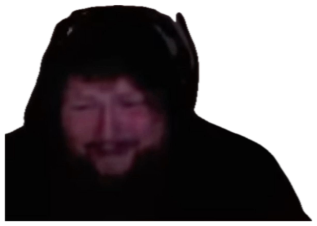 Man in a dark hoodie sitting in a dim room with a strained, uneasy grimace sticker