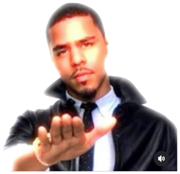 Suited man holding out his palm looking smug captioned 'wait, i'm actually so goated' sticker