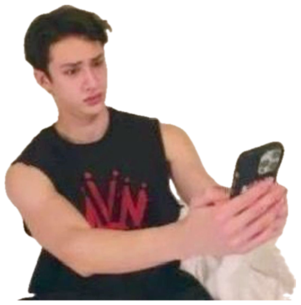 Young man sitting on a bed filming himself with a flat, disappointed frown sticker