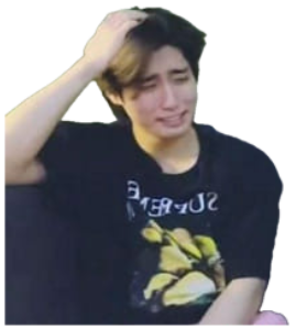 Young man crying and grabbing his hair while sitting on a couch, visibly distressed sticker