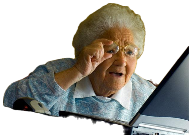 Grandma squinting through her glasses at a laptop, baffled by the screen sticker