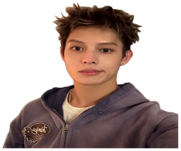 Spiky-haired teen selfie with a red arrow pointing to a shy blushing emoji overlay sticker
