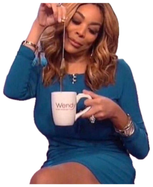 Woman sipping from a Wendy mug with a knowing, judgmental look sticker