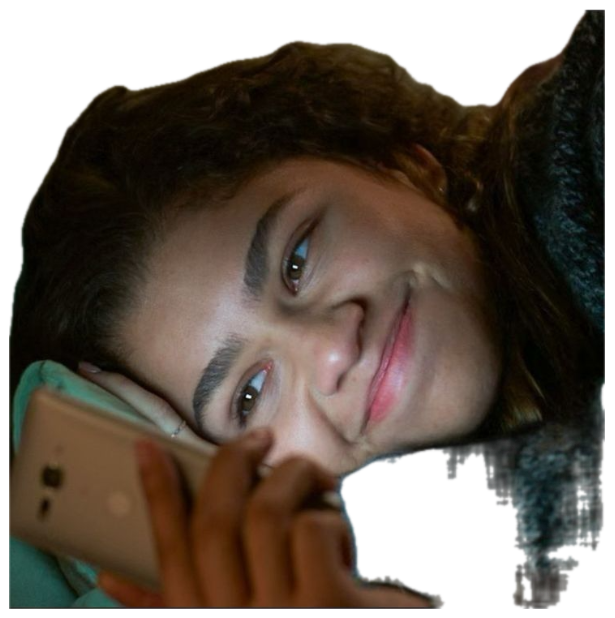 Woman lying in bed smiling softly at whatever just lit up her phone sticker